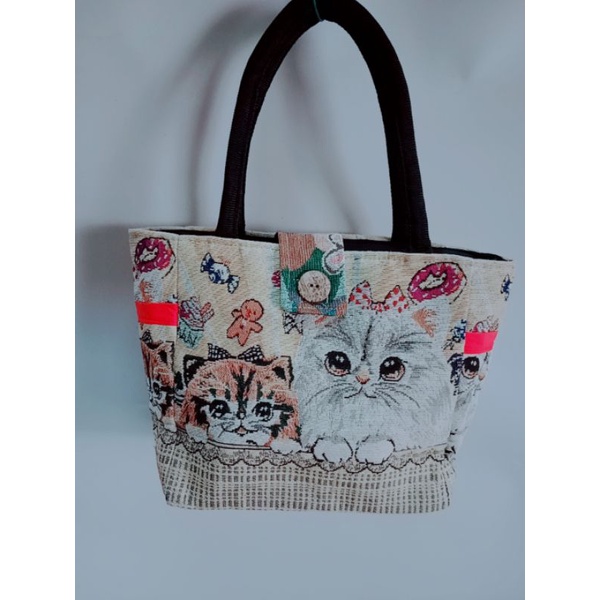 Túi làn khoá cúc dừa size 18*25cm