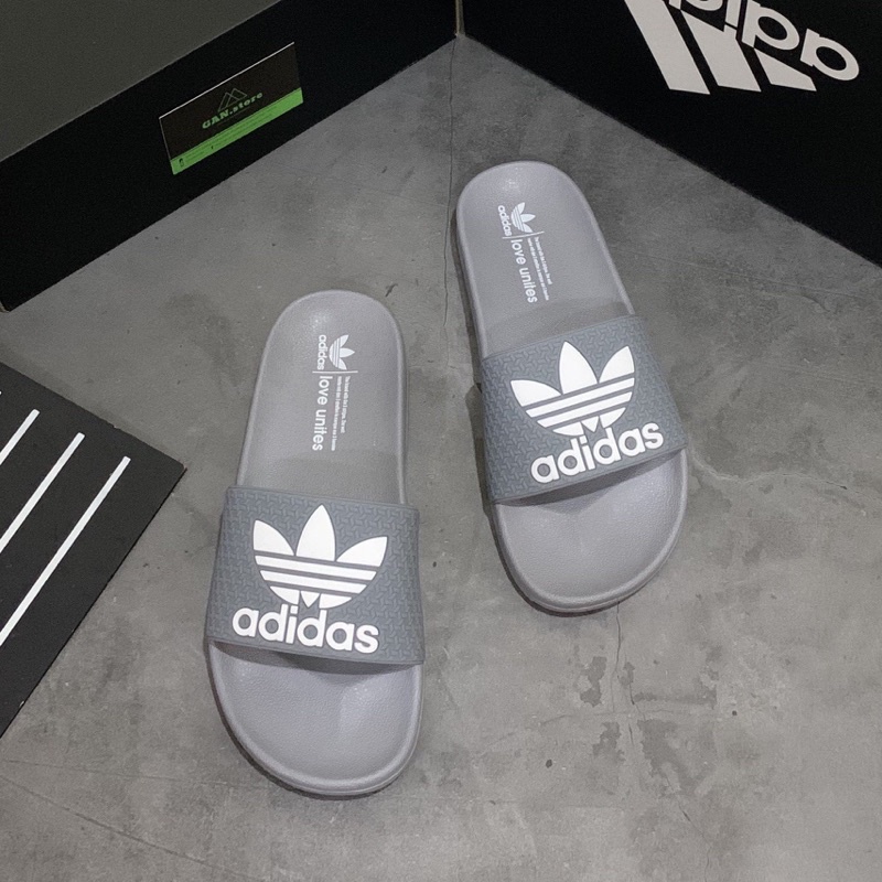 DÉP ADIDAS ADILETTE TRẮNG LOGO ĐEN - Xinh xắn full box