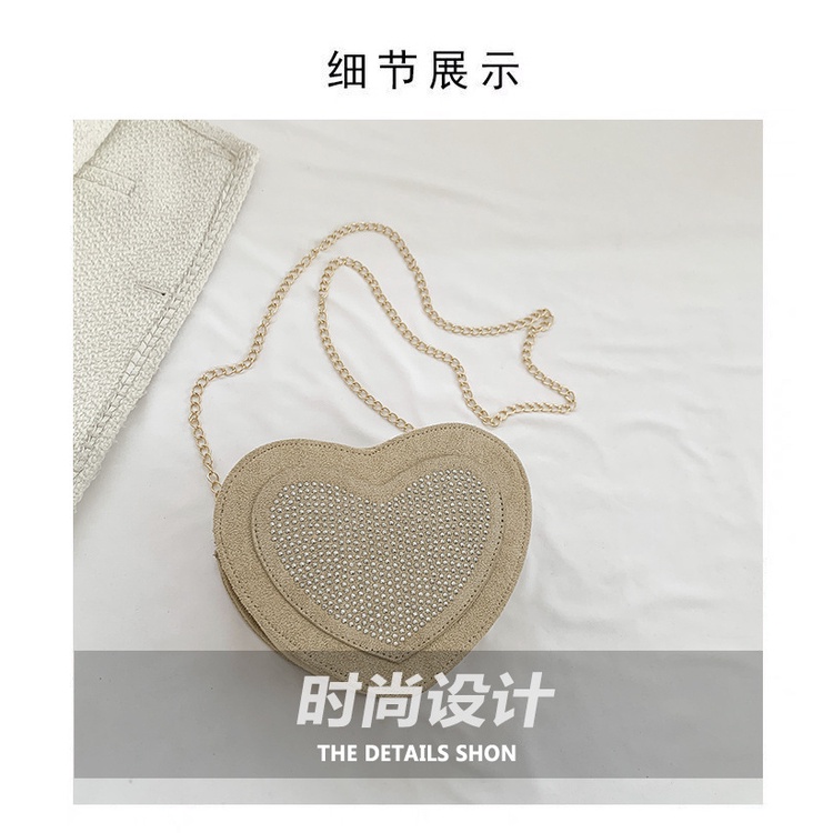 Túi Đeo Chéo Hình Trái Tim Đính Đinh Tán Thời Trang Cho Nữ