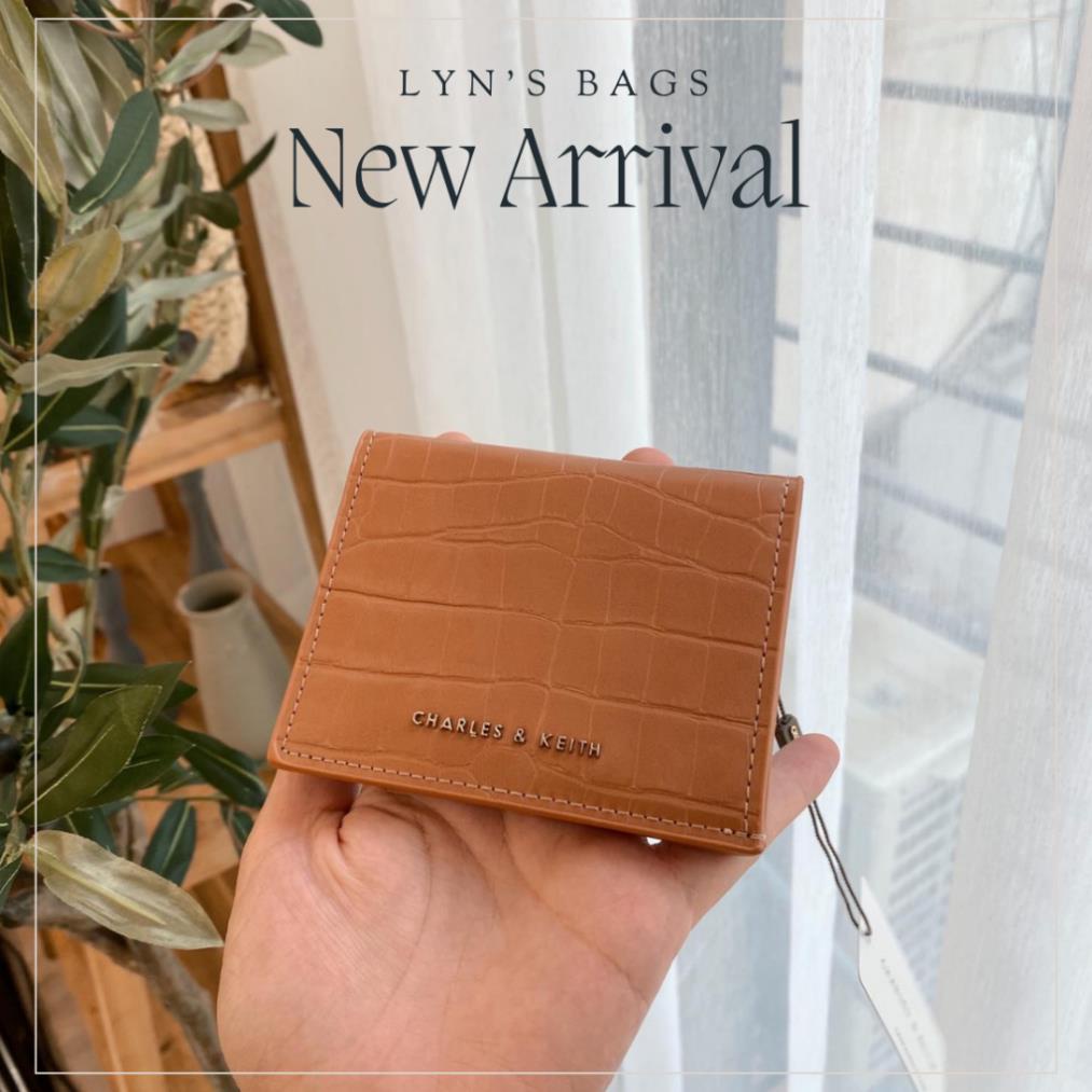 Ví CNK da rắn sẵn màu nâu sang chảnh fullbox