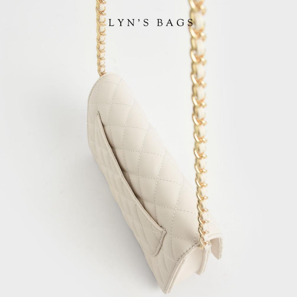 Quilted Push Lock Clutch Túi Trám Đen Trắng Thanh Lịch