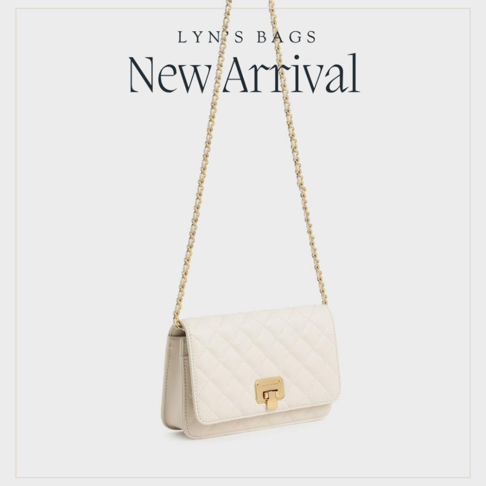 Quilted Push Lock Clutch Túi Trám Đen Trắng Thanh Lịch