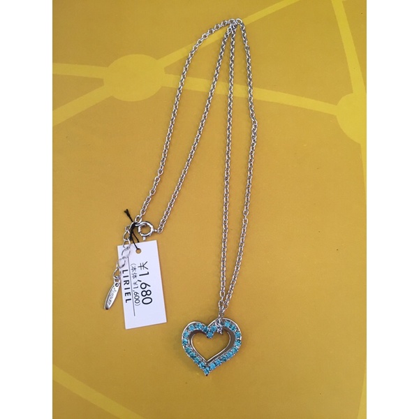 Dây chuyền hiệu Melody mặt tim đính full đá xanh