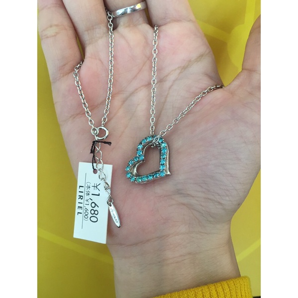 Dây chuyền hiệu Melody mặt tim đính full đá xanh