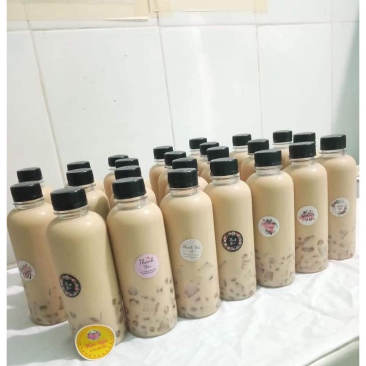 100 chai nhựa tròn 330ml kèm tem thank you ♥