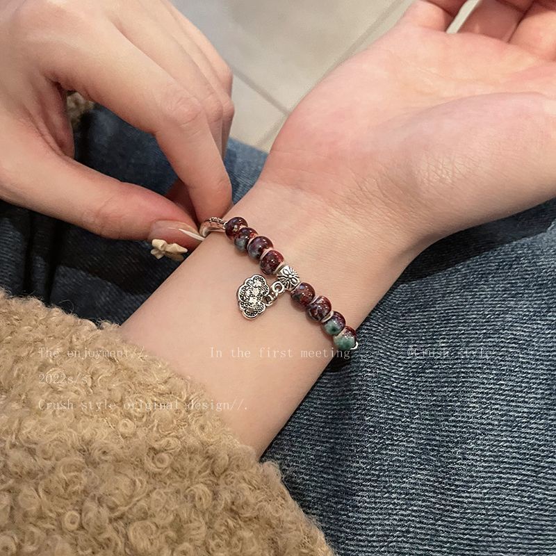 Vòng Tay Đá Hổ Phách Phong Cách Trung Hoa Cổ Điển Thiết Kế Mới Cho Nữ ne