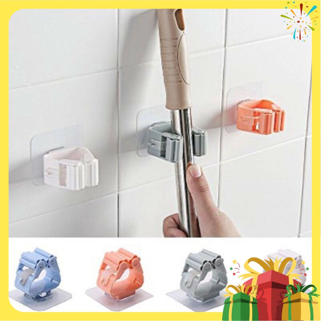   Móc kẹp giữ chổi, treo dụng cụ vệ sinh dán tường thông minh