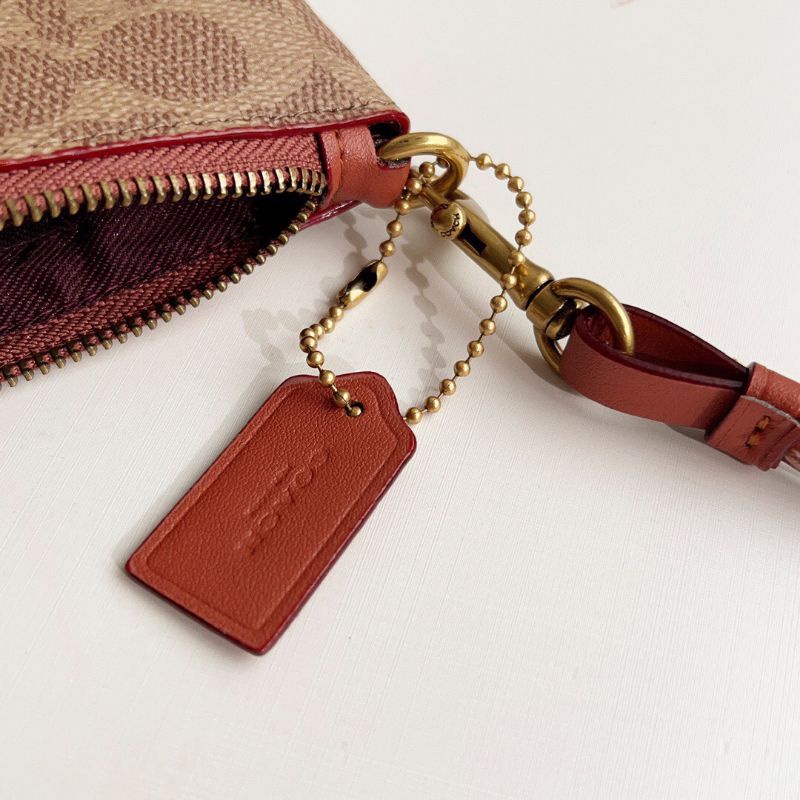 VÍ COACH SMALL WRISTLET IN SIGNATURE CANVAS