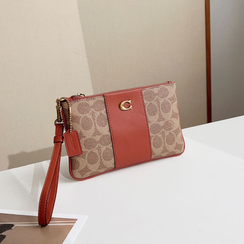 VÍ COACH SMALL WRISTLET IN SIGNATURE CANVAS