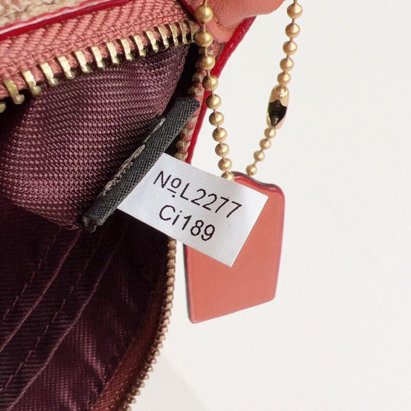 VÍ COACH SMALL WRISTLET IN SIGNATURE CANVAS