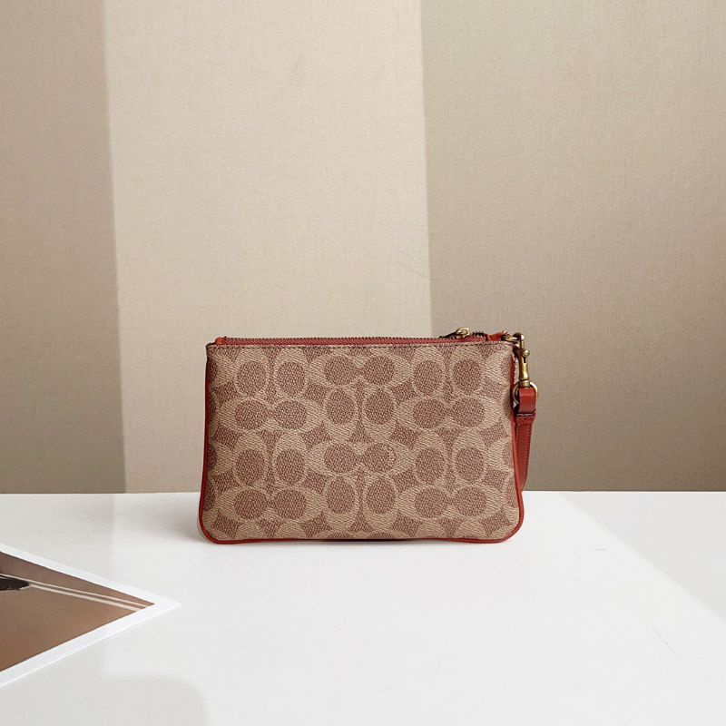 VÍ COACH SMALL WRISTLET IN SIGNATURE CANVAS