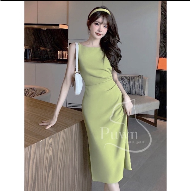 Đầm xanh lá xẻ tà