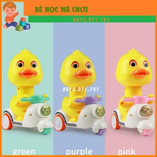 Đồ chơi chú vịt vàng lái xe máy chạy đà ấn đầu là chạy, êm ru không cần pin