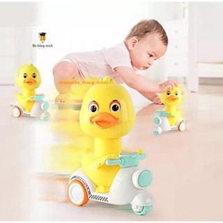 Đồ chơi cho bé cầm tay - chú vịt vàng lái xe máy chạy đà không pin bảo vệ môi trường