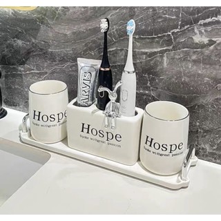 ( có sẵn) cốc sứ đánh răng, cốc uống nước , cốc cắm bàn chải , khay để đồ hình thỏ hospe