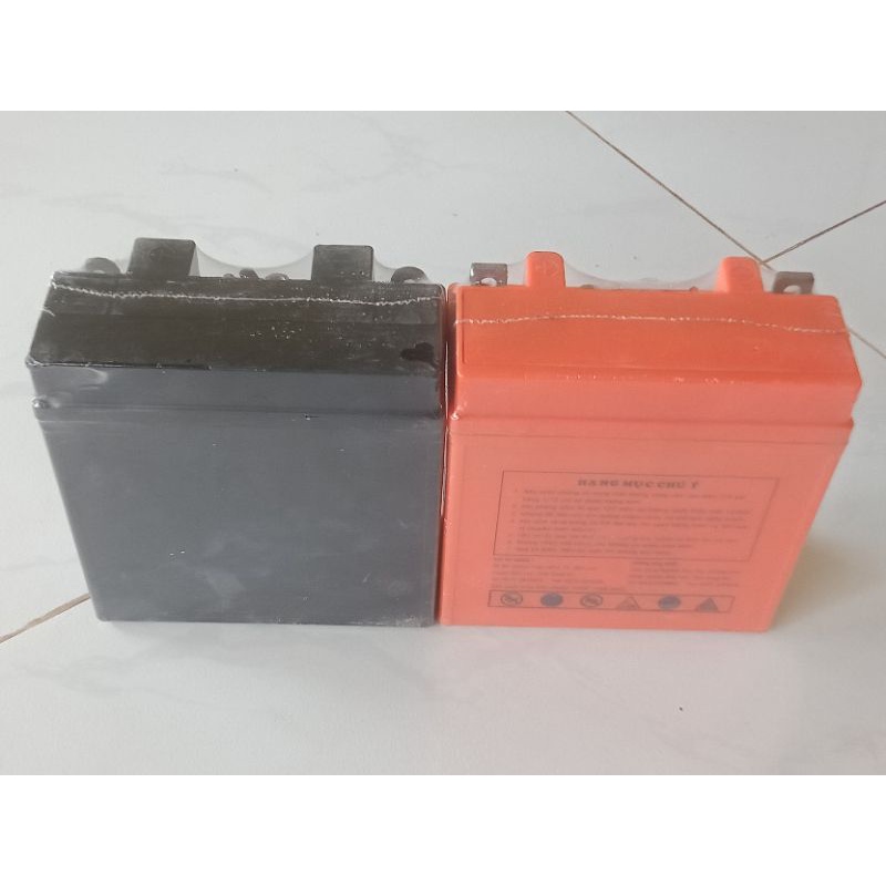 Bình điện lớn xe máy theo xe đẹp,12v và 6A, bảo hành 3 tháng.