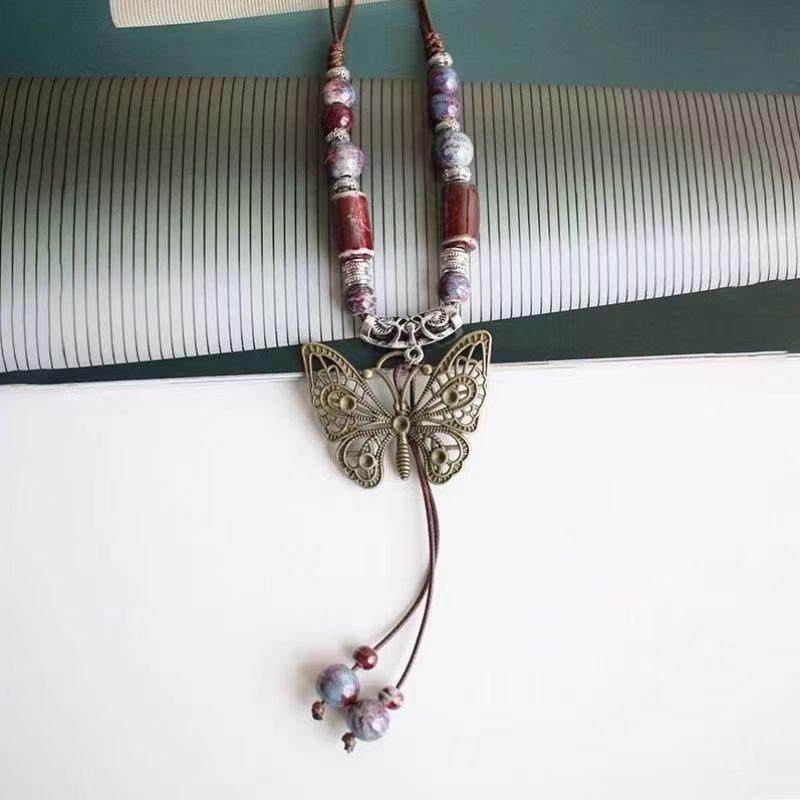 Dây Chuyền Mặt Bướm Và Chuông Gốm Phong Cách Dân Tộc Cổ Điển Dành Cho Nữ