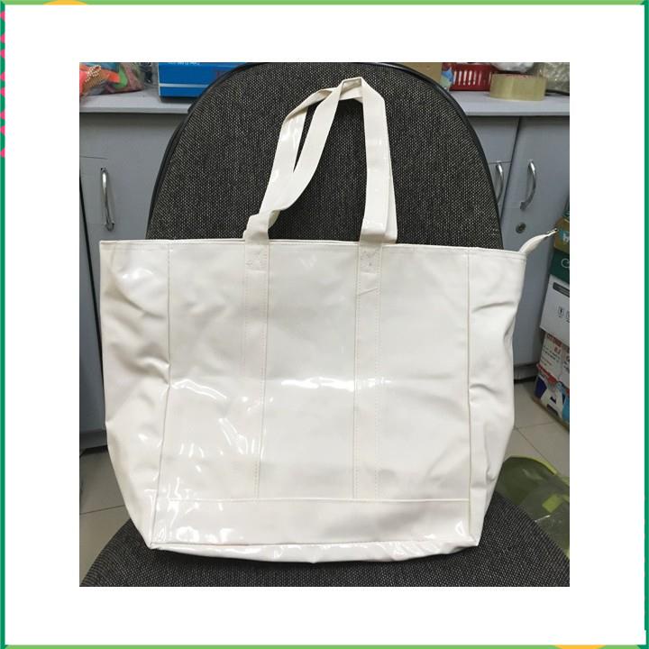 Túi xách simili bóng dây kéo 43x28x15cm màu trắng sữa hay cam .