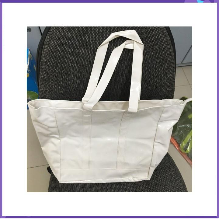 Túi xách simili bóng dây kéo 43x28x15cm màu trắng sữa hay cam .