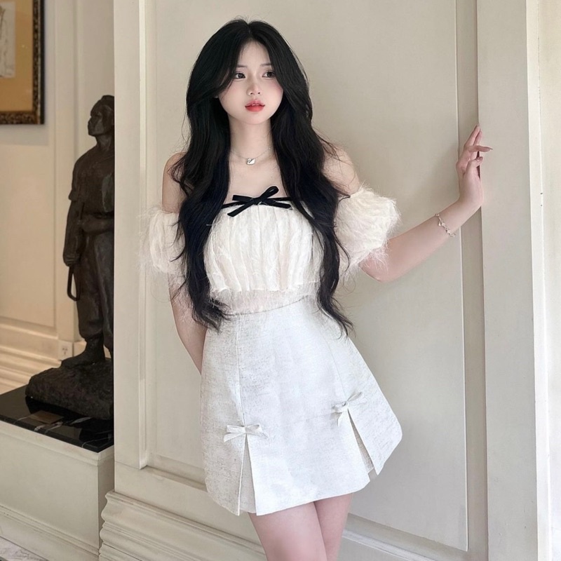 Set Áo Trễ Vai Kim Sa Tơ Hàn Nơ Đen Kèm Chân Váy Chữ A Màu Kem Xẻ 2 Bên