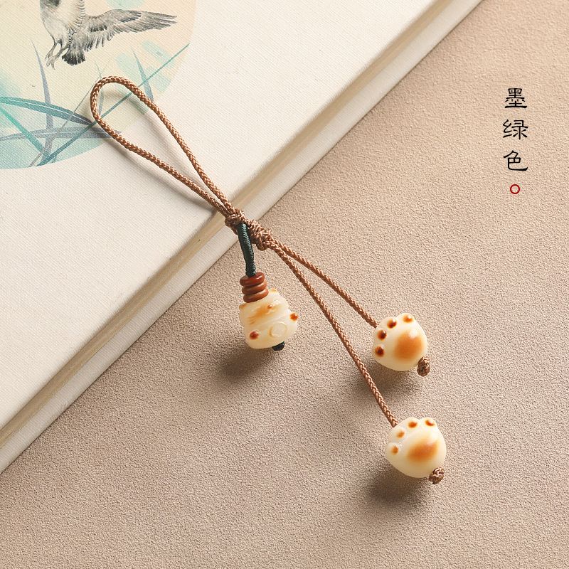 Móc Điện Thoại Hình Bàn Chân Mèo Bằng Than Hoạt Tính Dễ Thương