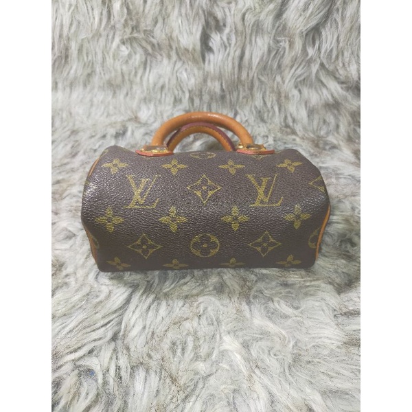 Túi xách si hiệu eo vì