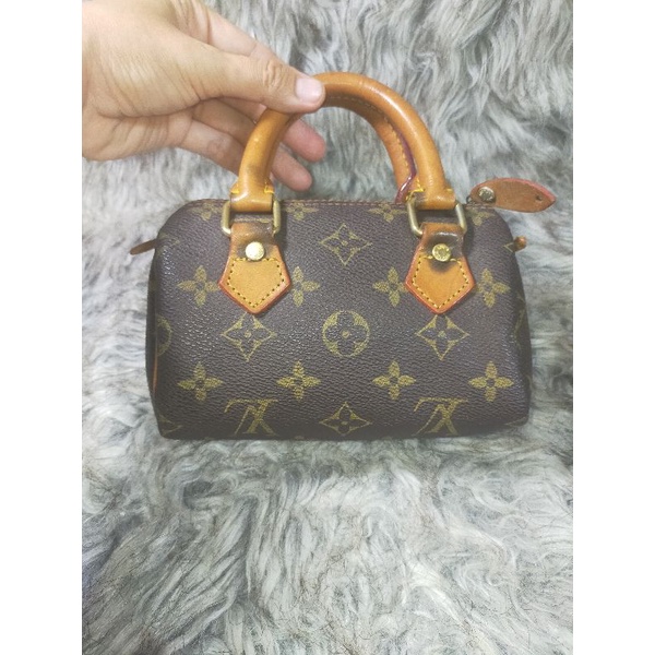 Túi xách si hiệu eo vì