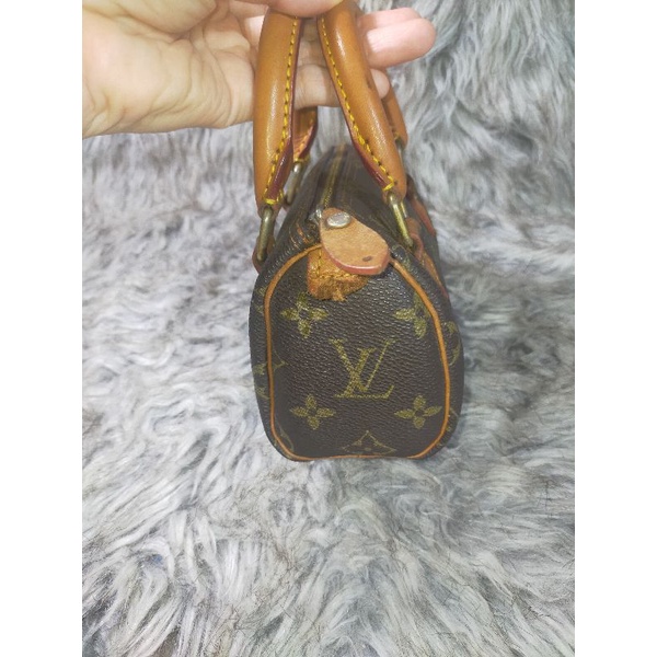 Túi xách si hiệu eo vì