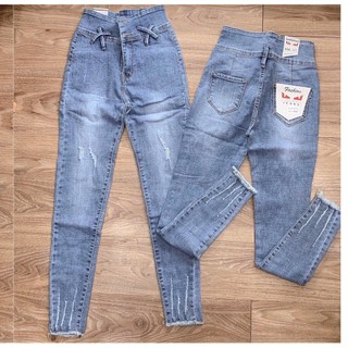 Quần jean nữ  kiểu X CHÉO  + hai cúc trước ( LƯNG SIÊU CAO ) màu xanh nhạt ( 26-30 ) 8dg4