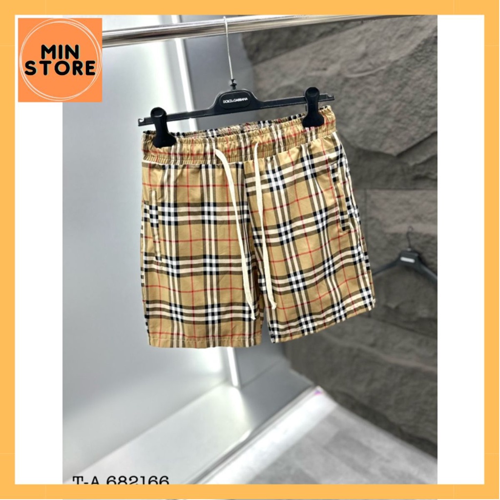 Quần Short Gió Nam Burberry Hoạ Tiết Kẻ Sọc Caro Màu Be Cạp Chun Dây Thắt . Quần Đùi Cho Các Boy Phố Đi Chơi Đi Biển Hot