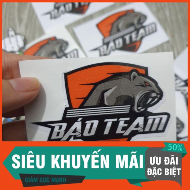 FREE Logo tem Sticker Trending Báo Team kích thước 7,6x5,3cm đen cam dán xe điện thoại,  nón bảo hiểm,... tùy thích