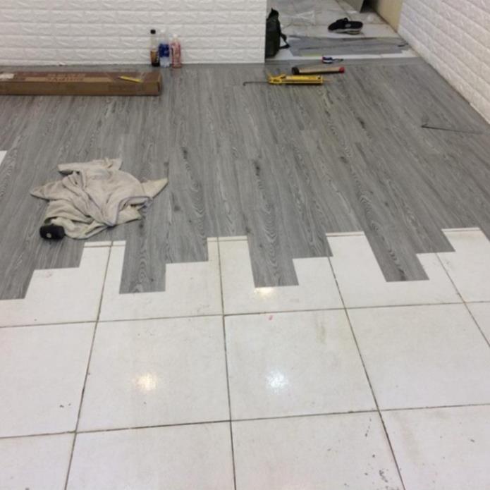 Sàn Nhựa Giả Vân Gỗ Sẵn Keo Tự Thi Công Dày 2mm Hàng loại 1 sàn nhựa bóc dán