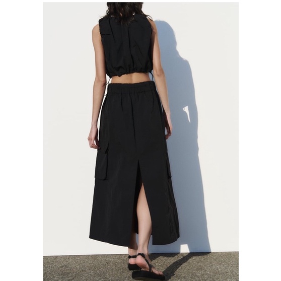 Set áo croptop + chân váy túi hộp màu đen