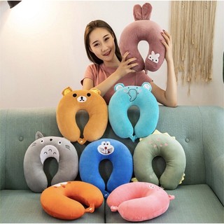 Gối kẹp cổ dùng để ngủ khi đi tàu xe, máy bay