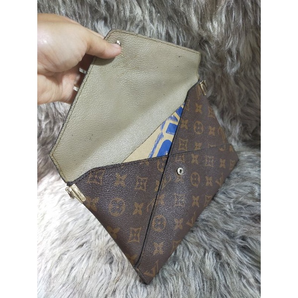 Clutch cầm tay hiệu eo vì