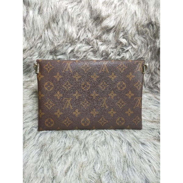 Clutch cầm tay hiệu eo vì