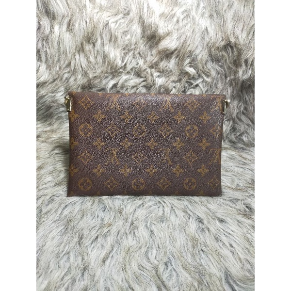 Clutch cầm tay hiệu eo vì