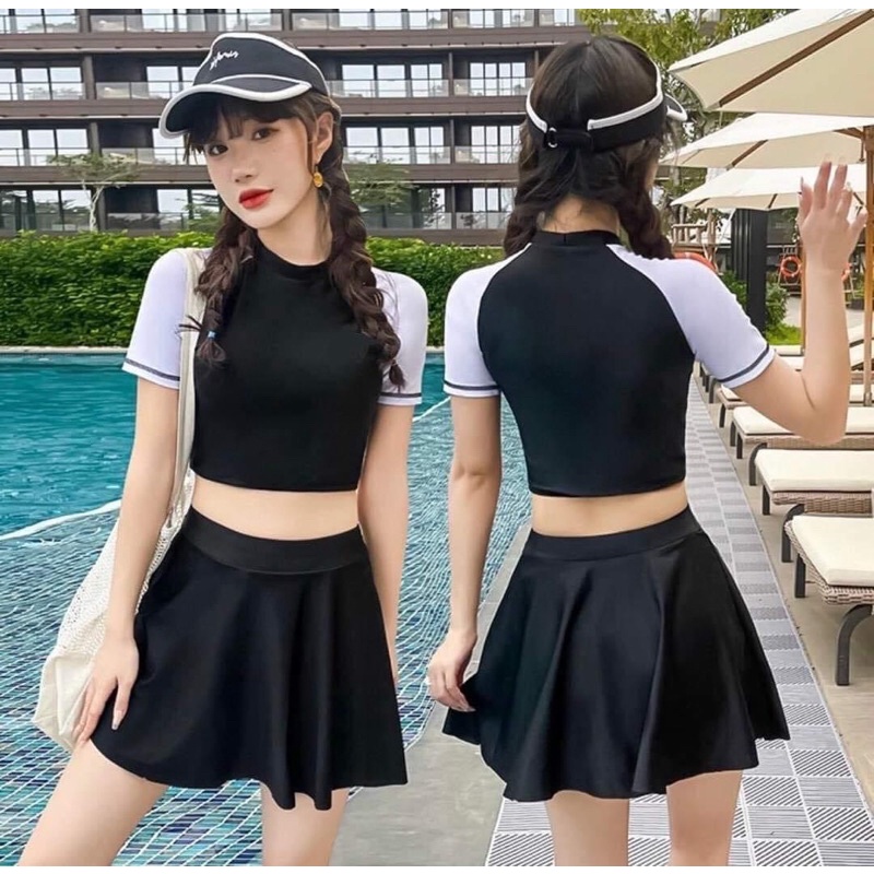 Bikini hai mảnh áo đen pha tay trắng kèm váy xoè