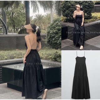 Váy hai dây hở lưng màu đen co giãn phù hợp đi biển