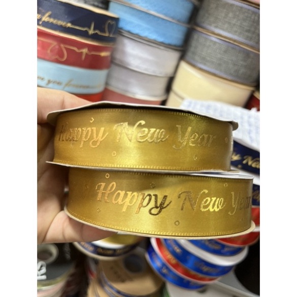 Cuộn duy băng chữ chúc mừng năm mới,noel  dài 50m ,rộng 2,5cm,trang trí giỏ quà Tết