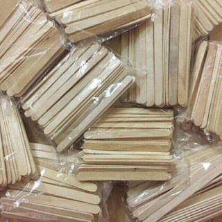Que kem gỗ que làm nhà gỗ đè lưỡi