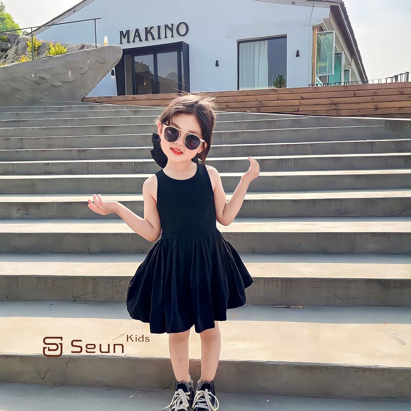 Đầm thun đen bé gái 2 dây đan chéo sau lưng xuân hè