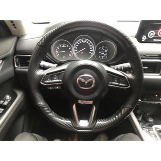Bọc vô lăng da mazda loại khâu