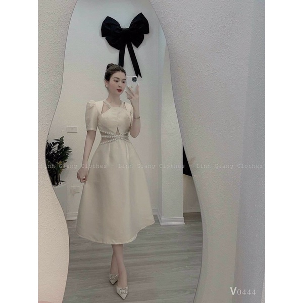 Đầm kem cut out đính ngọc chéo eo