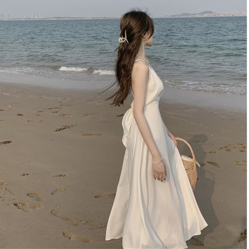 Jiashucheng Đầm Đi Biển Mùa Hè Hai Dây Vải Satin Thắt Nơ Sau Lưng Gợi Cảm Cho Nữ