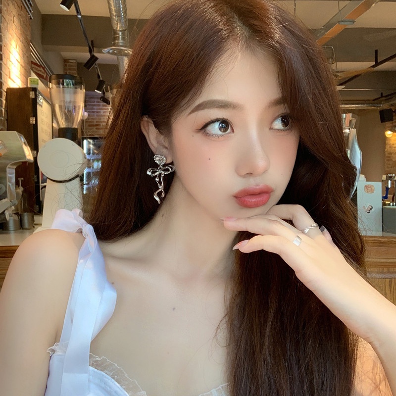 Khuyên tai kẹp không bấm lỗ chốt cố định K366 bằng hợp kim mạ bạc hình trái tim gắn nơ dáng dài bigsize Leous