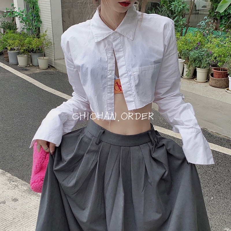 Áo sơ mi trắng dài tay crotop vải thô vạt lệch + chân váy dáng dài