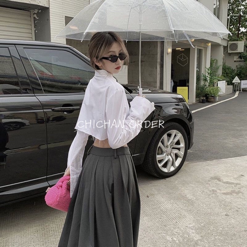 Áo sơ mi trắng dài tay crotop vải thô vạt lệch + chân váy dáng dài