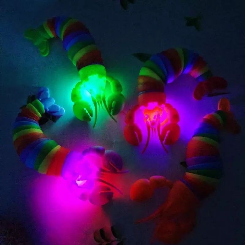 🏰 HCM 🏰 Đồ chơi giảm căng thẳng, giảm stress hình con tôm, con sâu vui nhộn cầm tay có phát sáng nhiều màu sắc