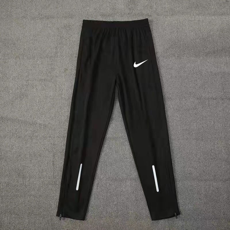 Quần Thể Thao Chạy Bộ Có Khóa Kéo Bên Hông Phản Quang Khô Nhanh Bốn Mùa Mới Cho Học Sinh Nam marathon track and field